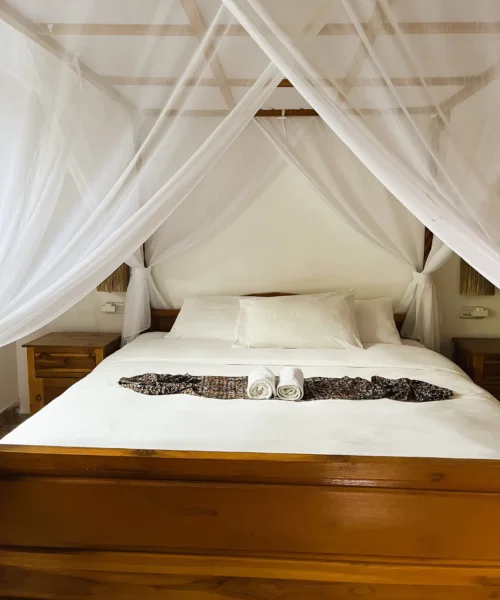 ... with king-size bed and a romantic mosquito net