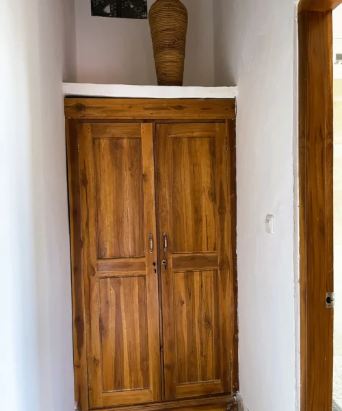 2.5 .... a wooden wardrobe to hang your cloth and store your valuables in the safe