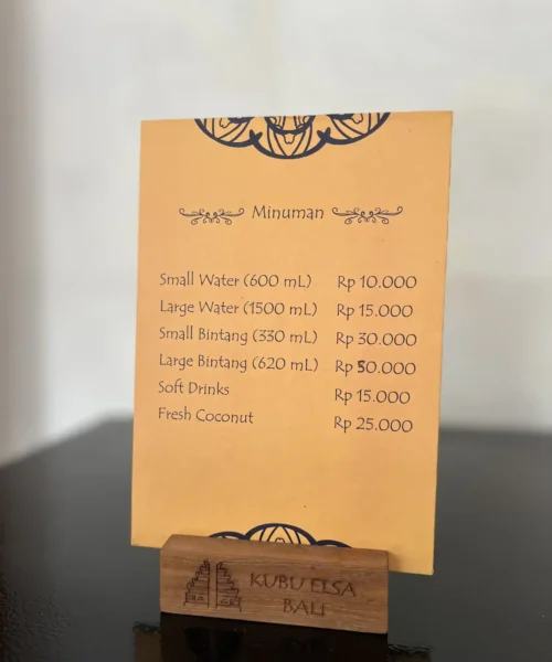 Drinks menu displayed in a wooden Kubu Elsa Bali holder