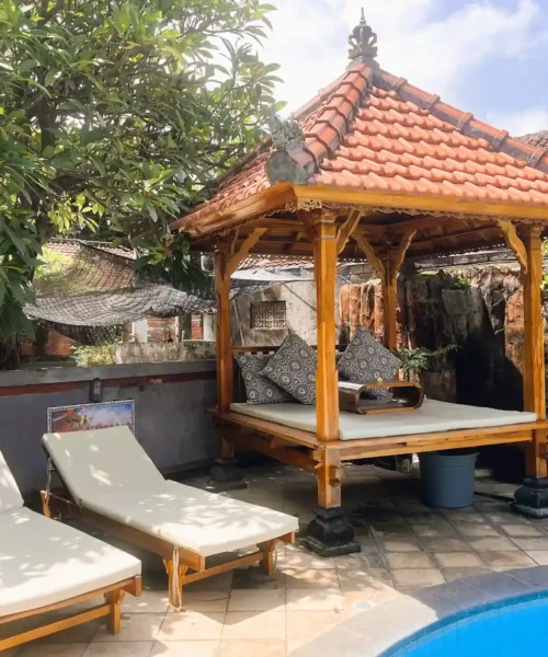 Swimming pool and traditional bale at Kubu Elsa Bali in Lovina